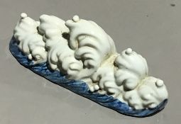 A Chinese porcelain brush rest