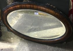 An Edwardian bevelled wall mirror