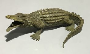 A bronze model of a crocodile