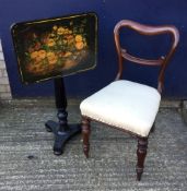 A Victorian painted tilt top table and chair