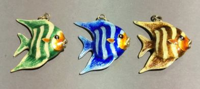 Three Chinese silver and enamel fish pendants