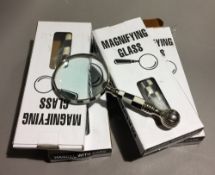 Four magnifying glasses