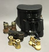 A quantity of binoculars and opera glasses