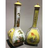 A pair of Continental porcelain bottle vases and covers,