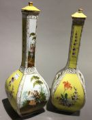 A pair of Continental porcelain bottle vases and covers,