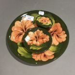A Moorcroft Hibiscus pattern plate,