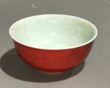 A Chinese red porcelain bowl