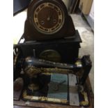 A Singer sewing machine and two clocks (a/f)