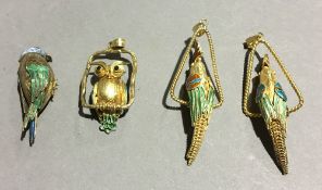 Four Chinese silver and enamel bird pendants