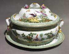 A large porcelain tureen on stand