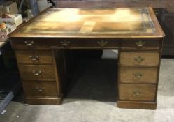 A large Victorian oak partners desk