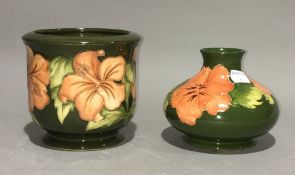 Two Moorcroft Hibiscus pattern vases