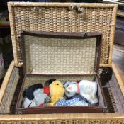 A child's small brown suitcase containing three Chad valley puppets and others