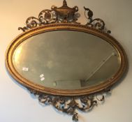 A Victorian gilt framed oval wall mirror
