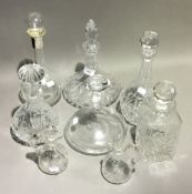 Four cut glass decanters,