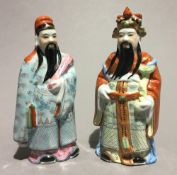 A pair of Chinese porcelain figures