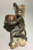 A Victorian wall hanging Majolica model of a monkey