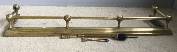 A brass fire curb, fire irons, etc.