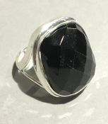 A silver dress ring