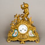 A 19th century painted porcelain mounted gilt metal mantle clock The white enamelled dial with