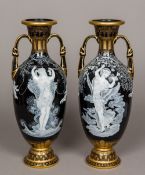 A pair of Sevres style pate-sur-pate type twin handled vases Each worked with scantily clad females,