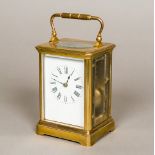 A Victorian lacquered brass cased striking carriage clock Of typical form,