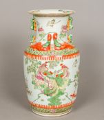 A Chinese porcelain vase Decorated with phoenixes and other exotic birds amongst floral sprays,