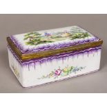 A 19th century French Sceaux pottery faience box The hinged cover decorated with a couple in a