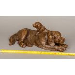 A large 19th century Black Forest carved wooden animalier group Formed as a Labrador Retriever and