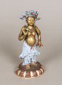 A Chinese bronzed porcelain figure of a deity Modelled bare chested wearing an elaborate headdress,