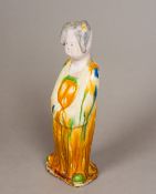 A Chinese Tang type pottery figure Modelled as a female courtesan. 30 cm high.