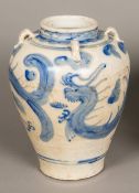 A Chinese Swatow ware blue and white porcelain vase Typically decorated with stylised dragons
