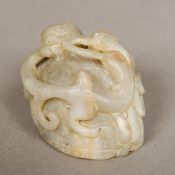 A Chinese jade carving Formed as a mythical beast on a turtle's back. 6 cm long.