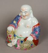 A Chinese porcelain model of Buddha, probably Republic period Typically modelled,