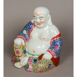 A Chinese porcelain model of Buddha, probably Republic period Typically modelled,