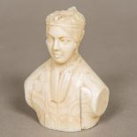 A Victorian carved whales tooth bust of Queen Victoria Inscribed to the underside "Bust of Her