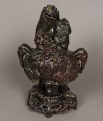 A large Chinese carved soapstone twin handled censer and cover The removable lid formed as