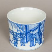 A Chinese blue and white porcelain brush pot Of gently flared circular section,