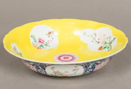 A 19th century Chinese porcelain dish The interior of crimped shaped form,