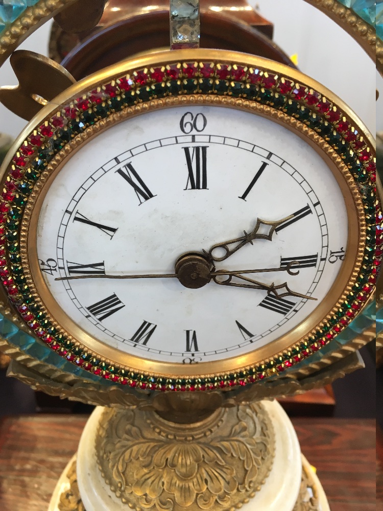 A Chinese gilt metal and coloured paste set mystery clock The 4 inch white painted dial with Roman - Image 4 of 11