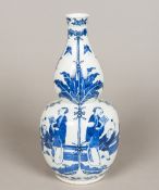 A 19th century Chinese blue and white porcelain vase Of double gourd form,