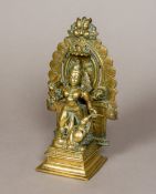 An antique Indian bronze shrine Modelled as the goddess Lakshmi (the Hindu goddess of wealth and