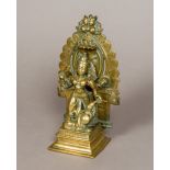 An antique Indian bronze shrine Modelled as the goddess Lakshmi (the Hindu goddess of wealth and