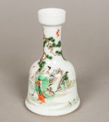 A Chinese porcelain vase Of mallet form, worked with a figure and a crane before a pine tree,