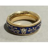 An 18 ct gold and cold enamelled Wellendorff spinning ring,