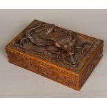 A late 19th century Eastern carved wooden box Of rectangular hinged form,