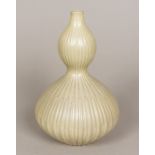 An Eastern, possibly Korean, celadon glazed vase Of ribbed double gourd form,