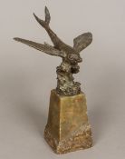 An early 20th century patinated bronze model of a flying fish Typically modelled,