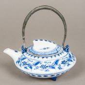 A Chinese blue and white porcelain teapot and cover Decorated with floral sprays,