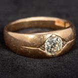 An 18 ct gold diamond solitaire ring The gypsy set stone spreading to approximately 0.75 carat.